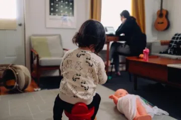 child playing with a toy